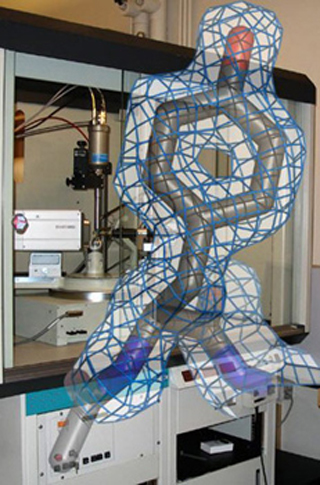 Molecular model of amino acid tyrosine overlaid on photograph of xray diffractometer.