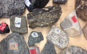 Several rocks and minerals on a countertop.