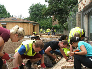 Volunteers working on a construction project.